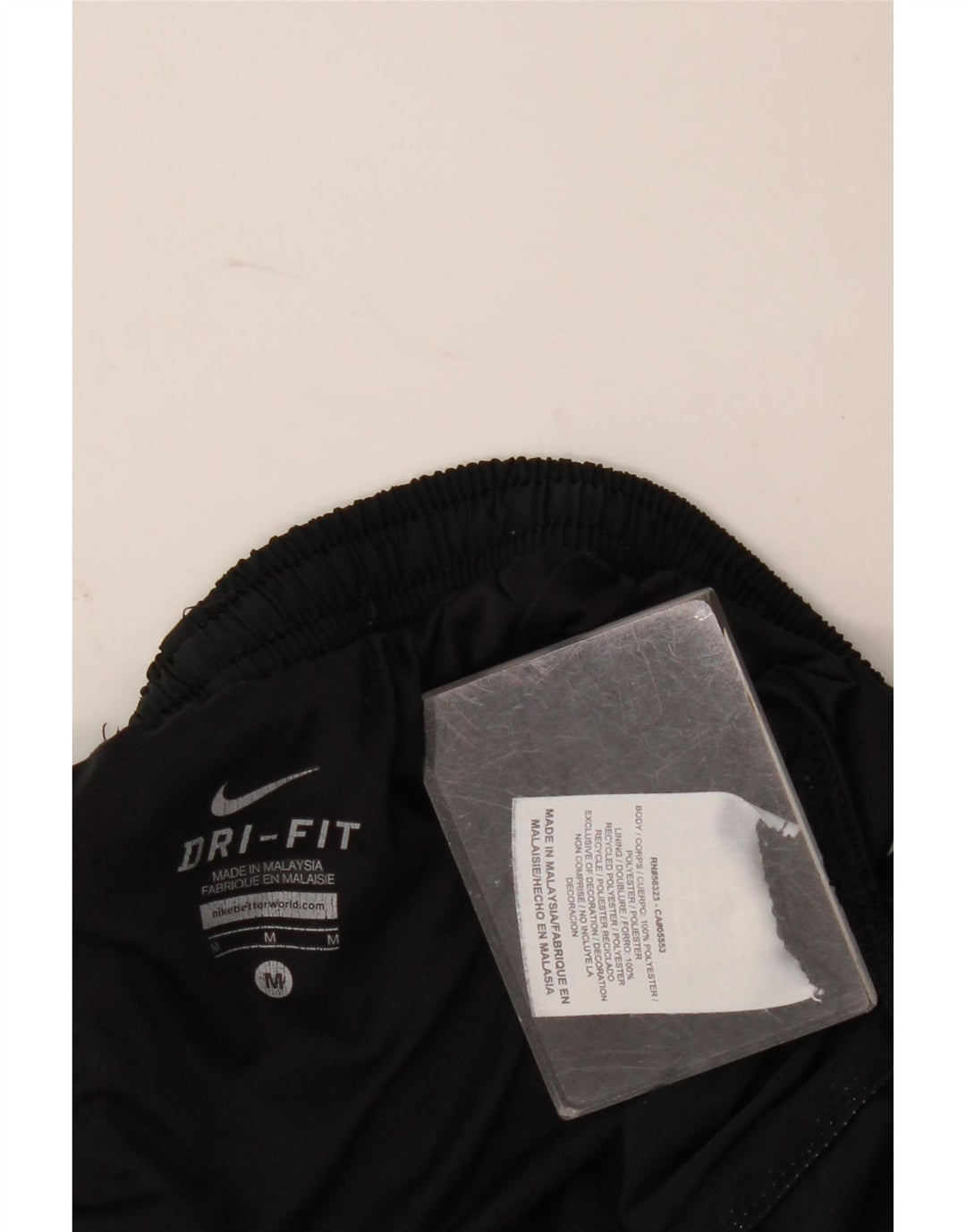 Nike - Pantalones cortos deportivos Dri Fit para mujer, talla M, poliéster negro