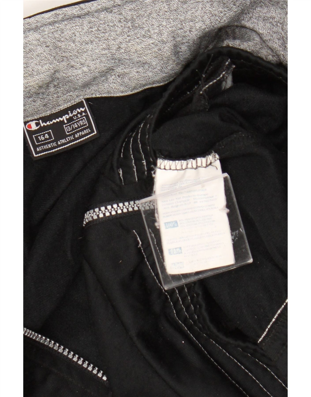 Champion Chaqueta de chándal para niños 13-14 años Negro Poliéster color block