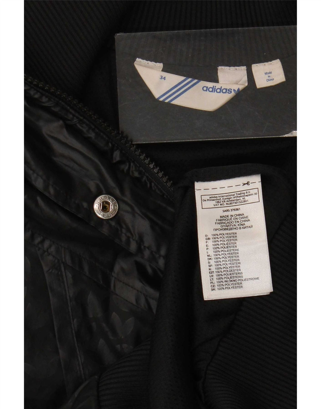Adidas Chaqueta de chándal gráfica para mujer EU 34 XS Poliéster negro