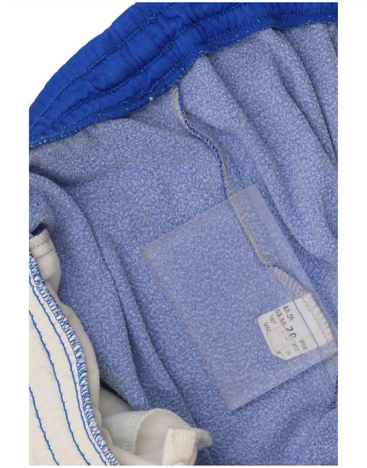 ASICS Pantalones de chándal gráficos para hombre Joggers IT 52 XL Azul Colorblock