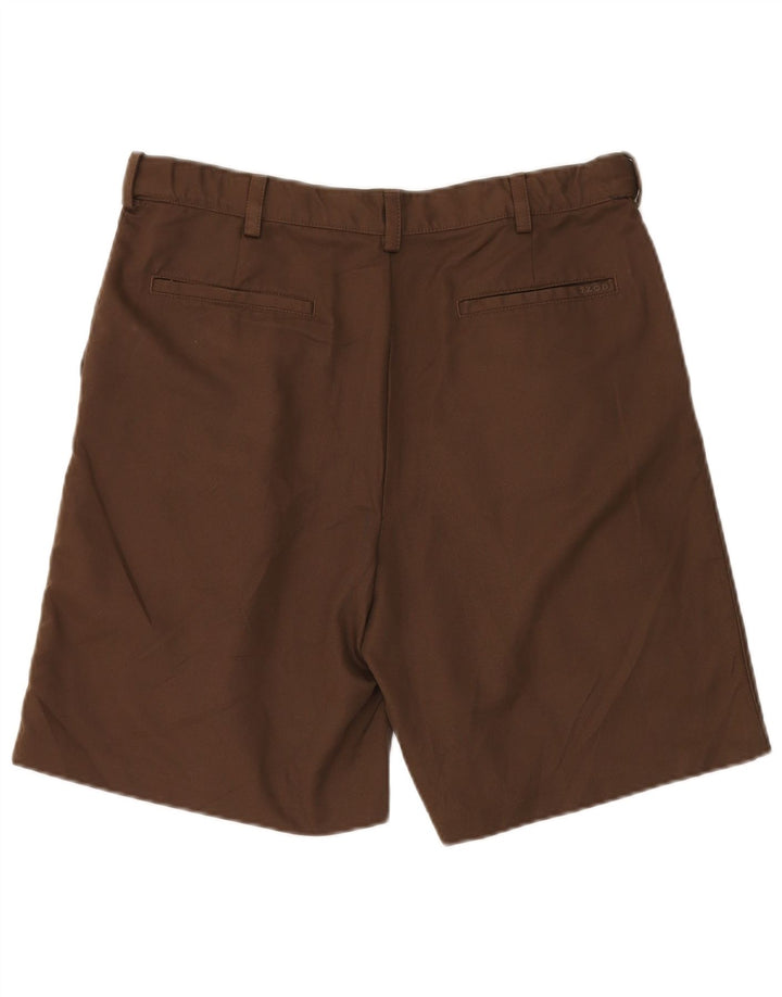 IZOD Pantalones cortos chinos pegados para hombre W34 Poliéster marrón grande