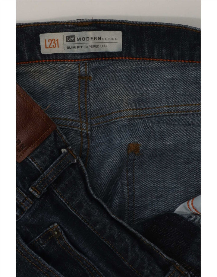 Vaqueros ajustados y cónicos para hombre Lee W36 L28 Azul