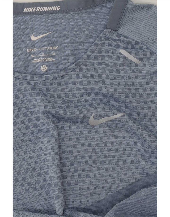 Nike Camiseta Dri Fit para mujer UK 44 Poliéster geométrico azul medio