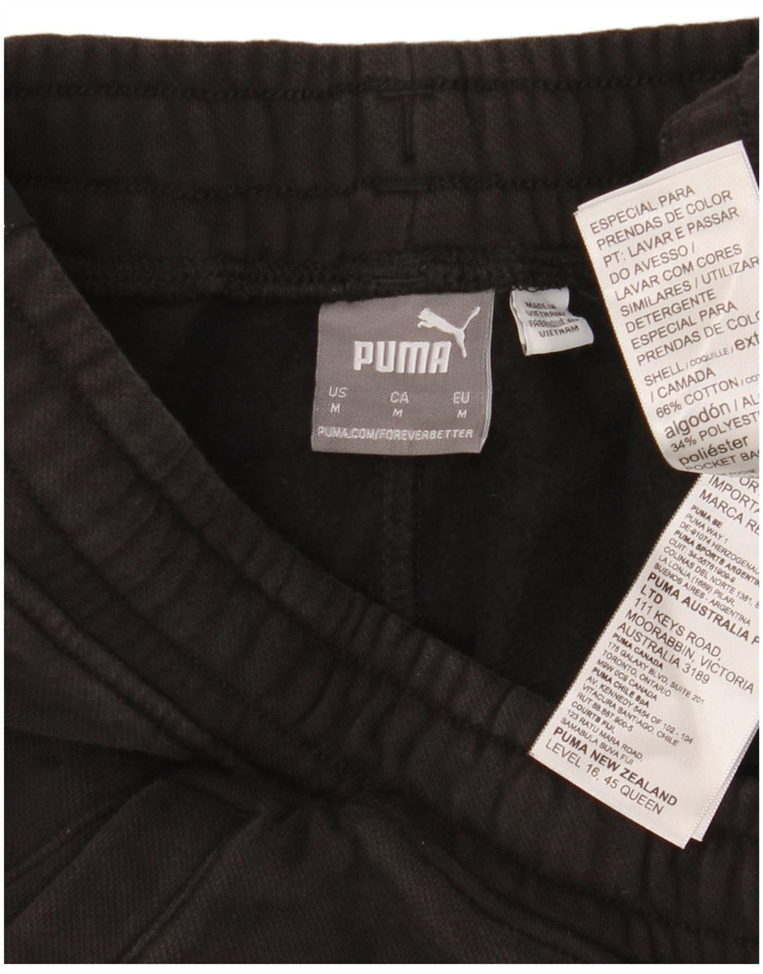 Puma - Pantalones cortos deportivos para mujer, talla 40, algodón negro mediano
