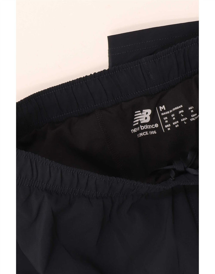 Pantalones cortos deportivos New Balance para hombre azul marino mediano