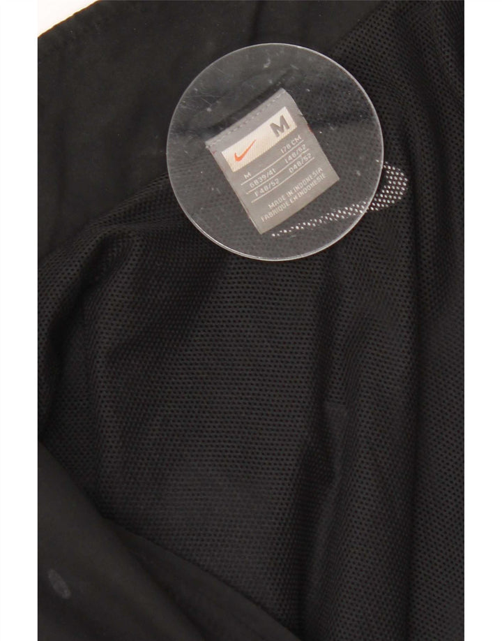 Nike Chaqueta de chándal con gráfico gráfico en bloques de color negro mediano para hombre