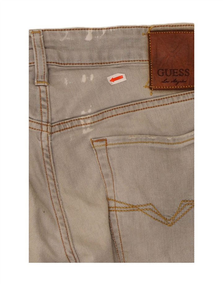 GUESS Vaqueros pitillo desgastados para hombre W32 L32 Algodón gris