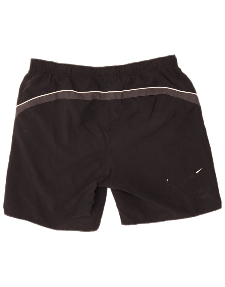 Pantalones cortos deportivos Nike de nailon color block en negro mediano para hombre