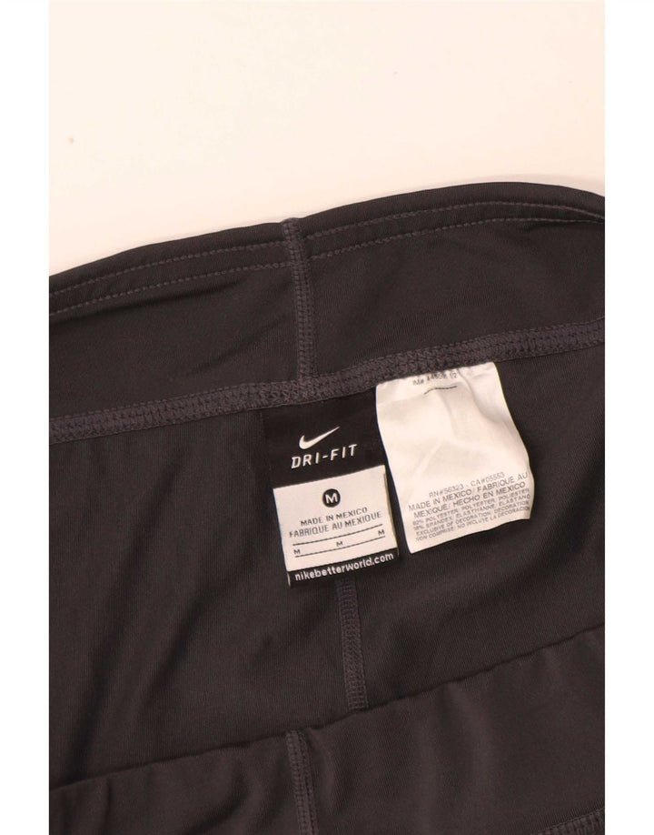 Nike - Pantalones cortos deportivos Dri Fit para mujer, talla M, poliéster negro