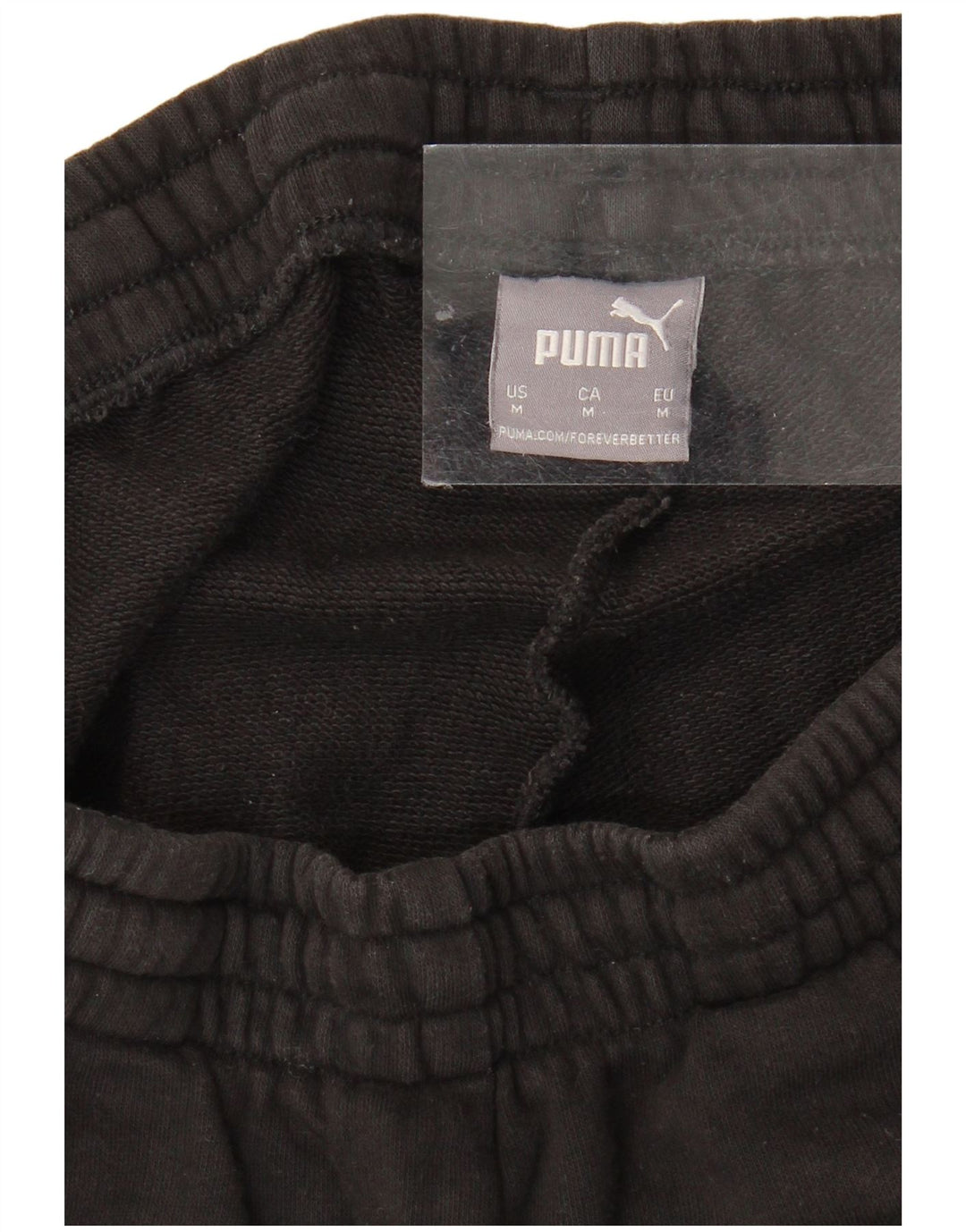 PUMA Pantalones de chándal con estampado gráfico Joggers Medium Black para hombre
