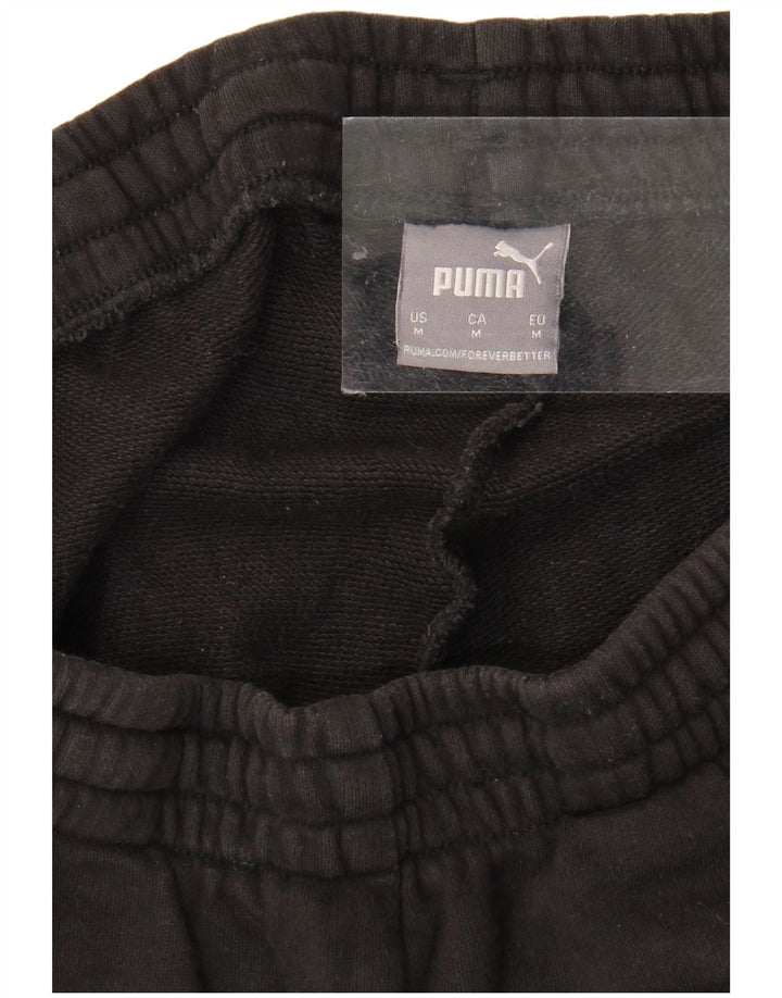 PUMA Pantalones de chándal con estampado gráfico Joggers Medium Black para hombre
