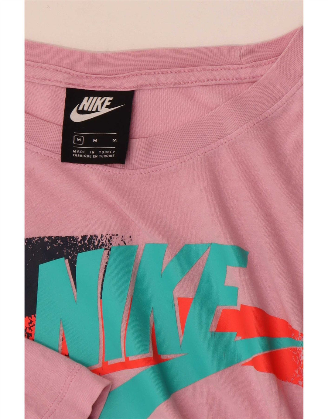 Camiseta Nike Graphic para hombre, color rosa medio