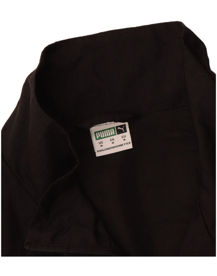 PUMA Chaqueta superior de chándal con gráfico corto para mujer UK 14 Medium Black Nylon
