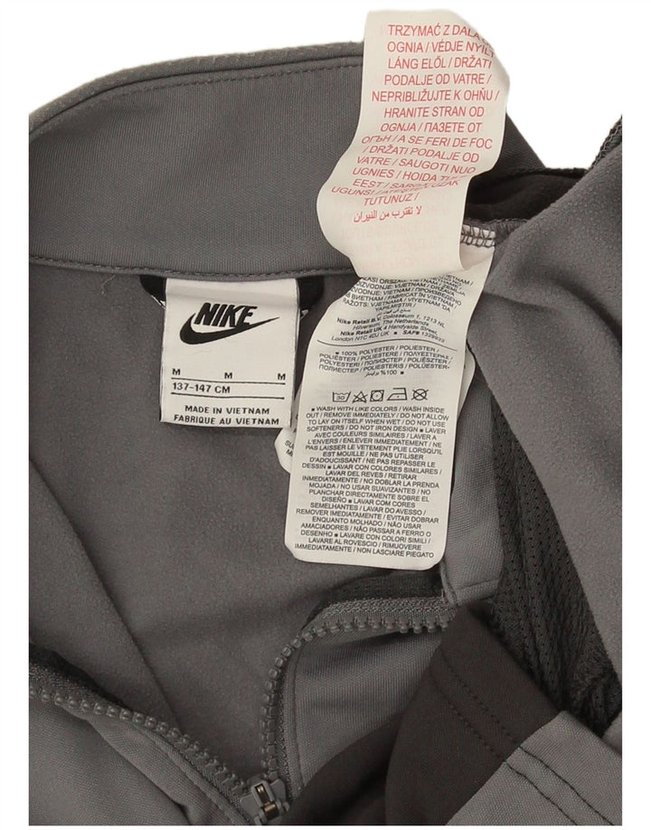 Nike - Chaqueta de chándal con gráfico para niños, 10-11 años, color gris medio