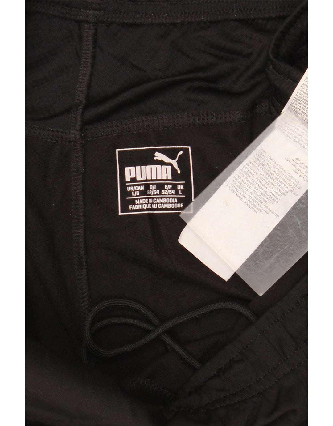 PUMA Pantalones de chándal con estampado gráfico para hombre, poliéster negro grande
