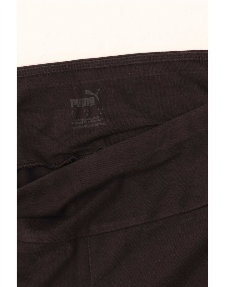 Puma - Pantalones cortos deportivos gráficos para mujer, talla 40, color negro