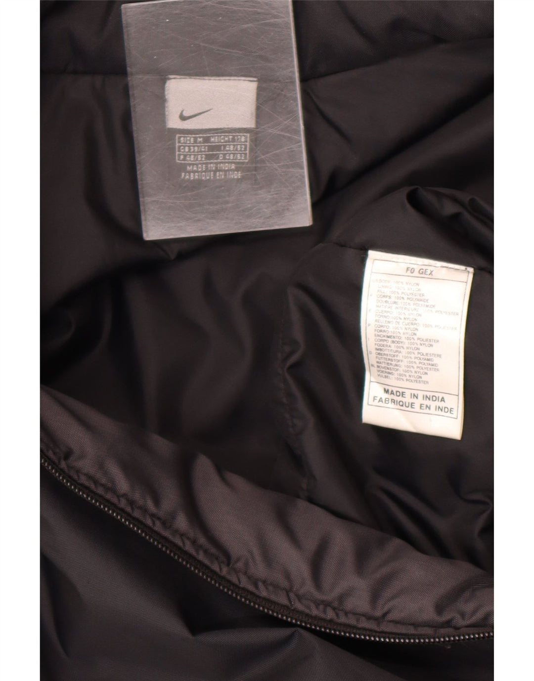 Chaqueta cortavientos Nike para hombre de nailon negro mediano