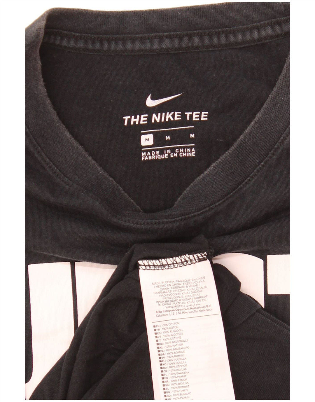 Nike Camiseta gráfica para hombre Top mediano de algodón negro