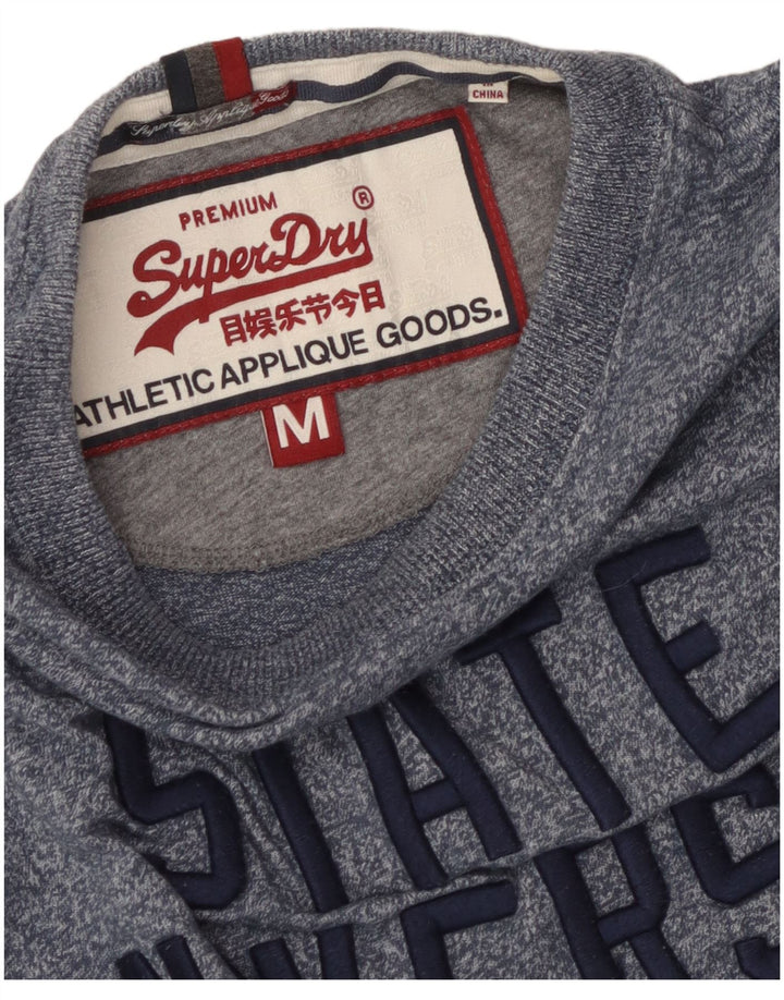 Superdry Camiseta estampada con estampado de rayas en azul medio para hombre