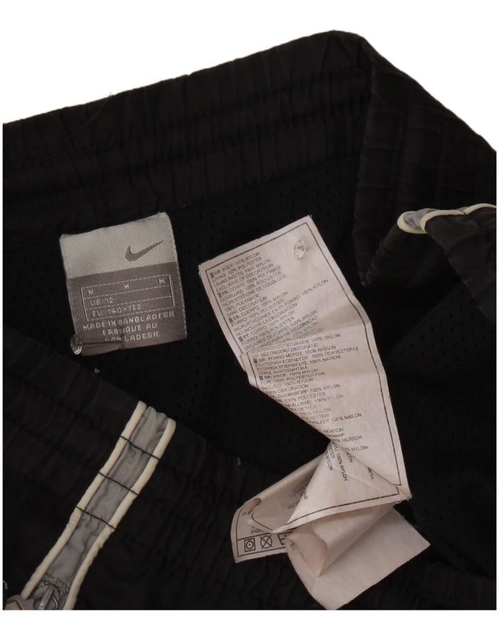 Nike - Pantalón de chándal para niño, 11-12 años, tamaño mediano, nailon negro