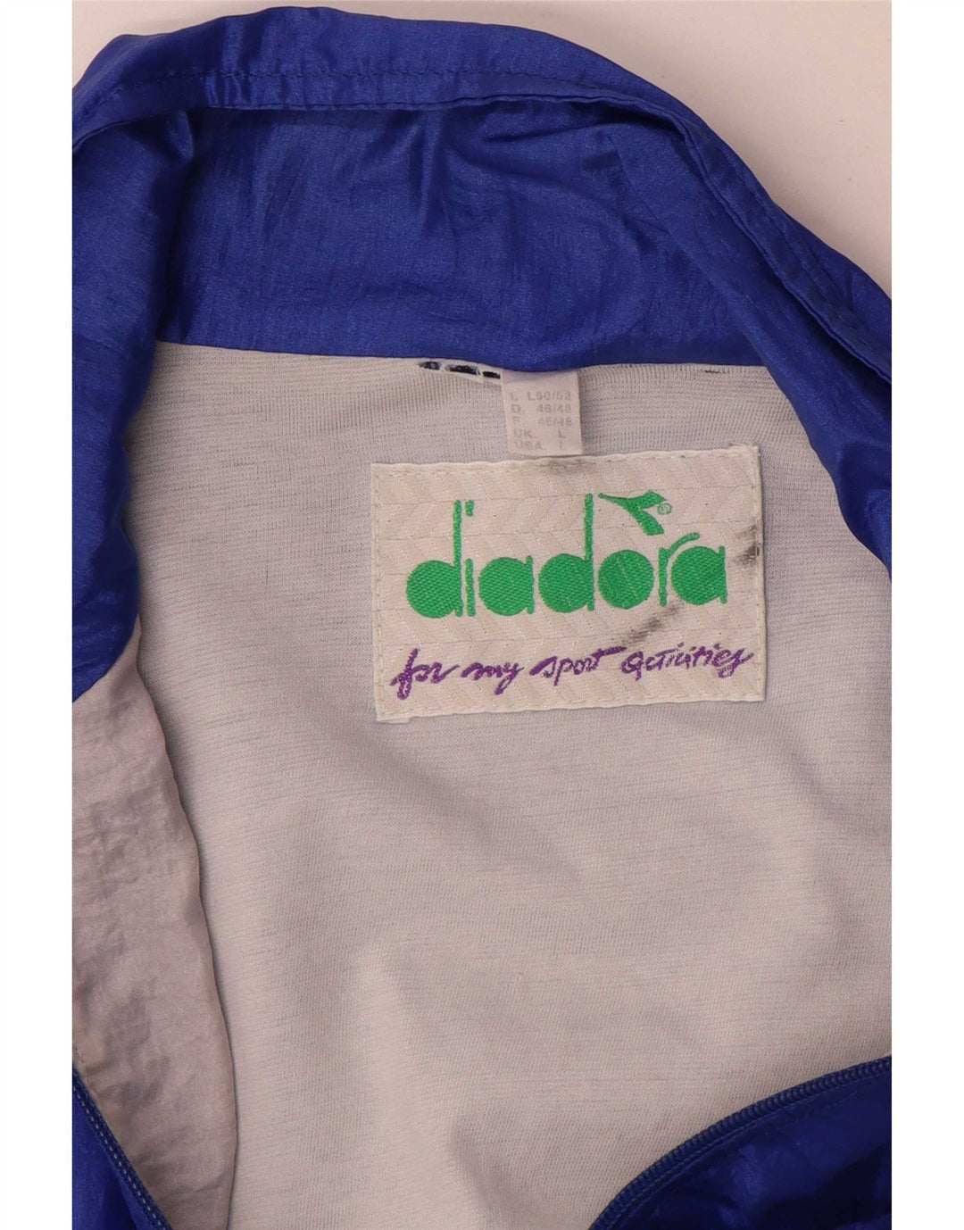 Diadora Chaqueta de chándal para hombre con diseño en bloques de color azul grande