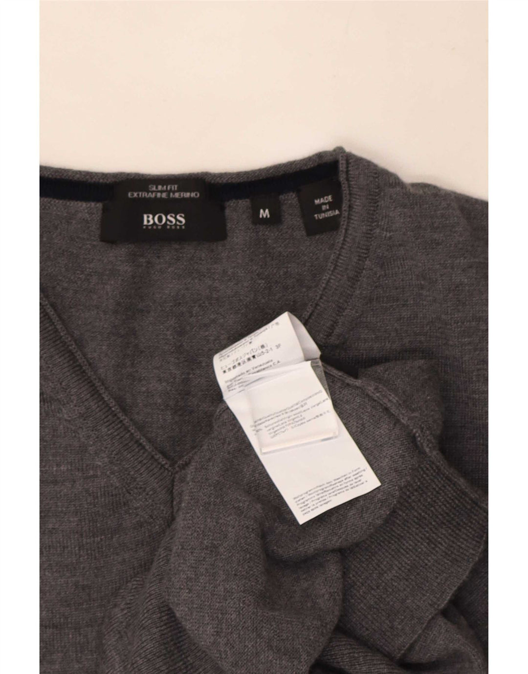 Hugo Boss Hombre | Jersey slim fit con cuello en V de lana gris medio
