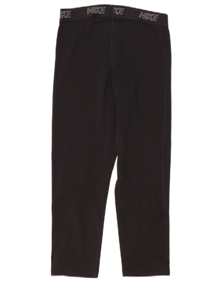 Nike - Leggings capri Dri Fit para mujer, talla M, color negro