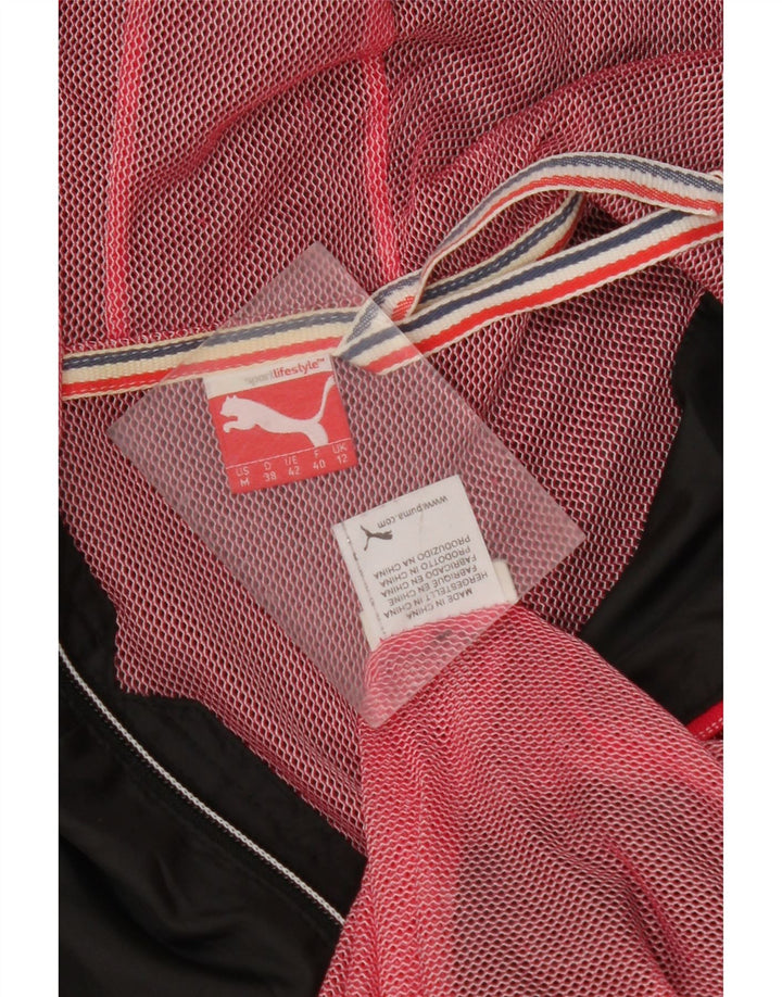 PUMA Chaqueta impermeable con capucha para mujer UK 12 Medium Black