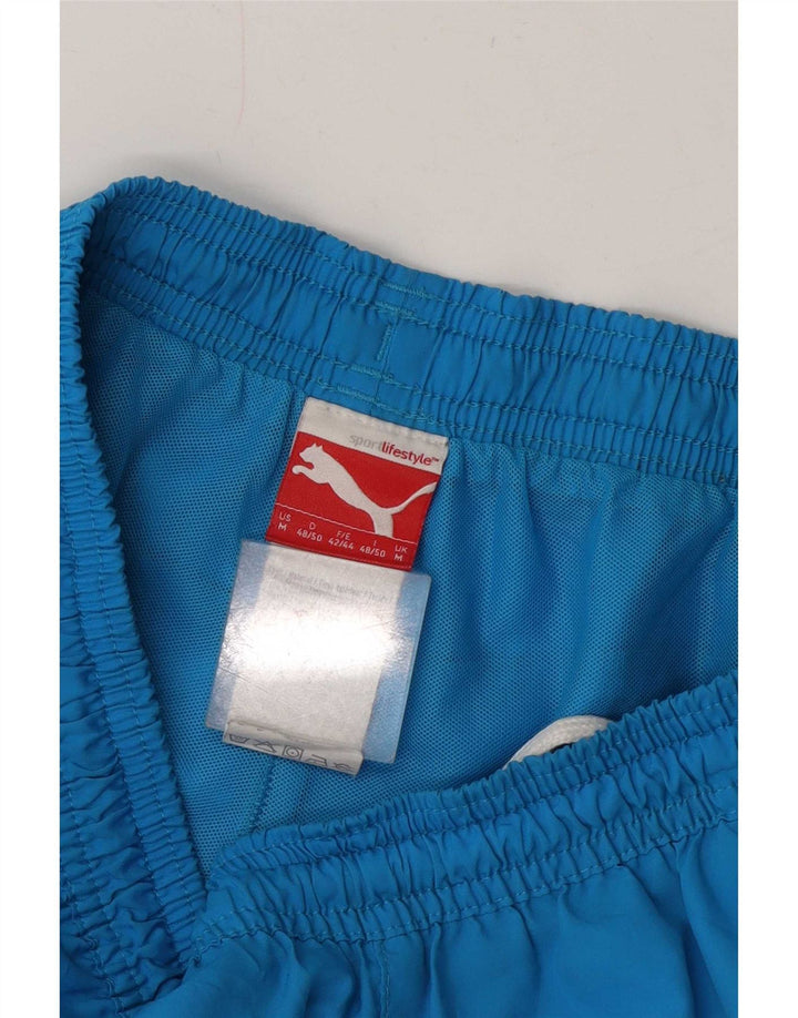 Pantalones cortos deportivos con gráficos Puma para hombre Poliéster azul medio