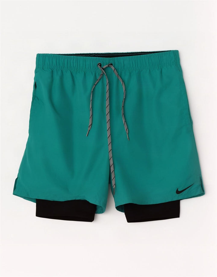 Pantalón corto deportivo Nike Hombre Poliéster turquesa medio