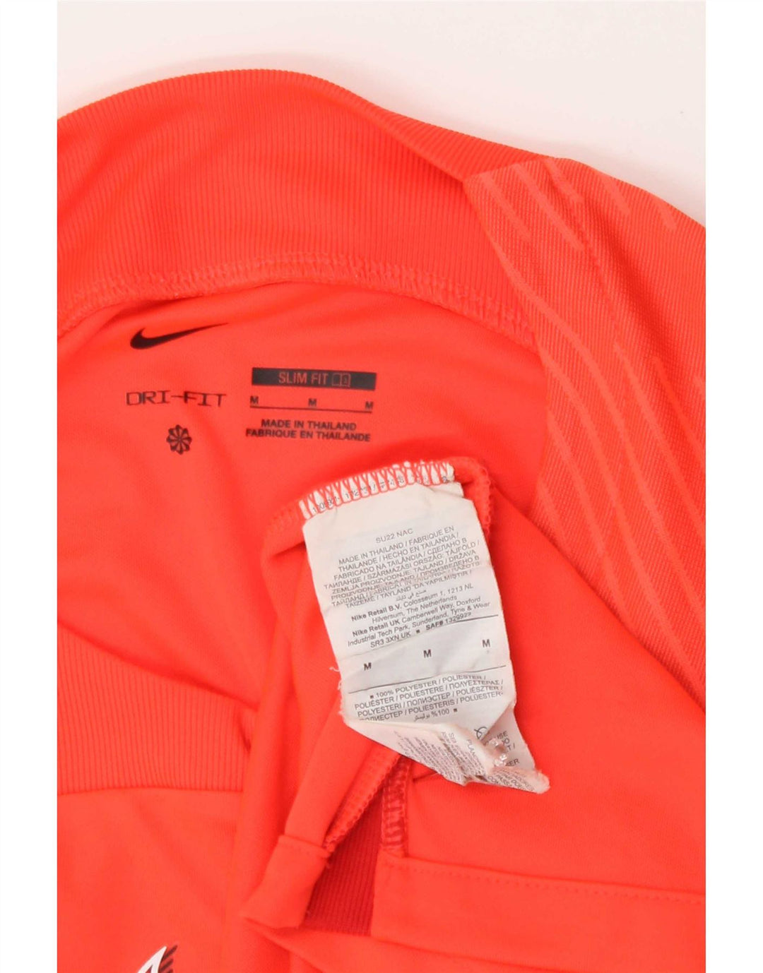 Camiseta con gráfico Nike para hombre Top poliéster con bloques de color naranja medio