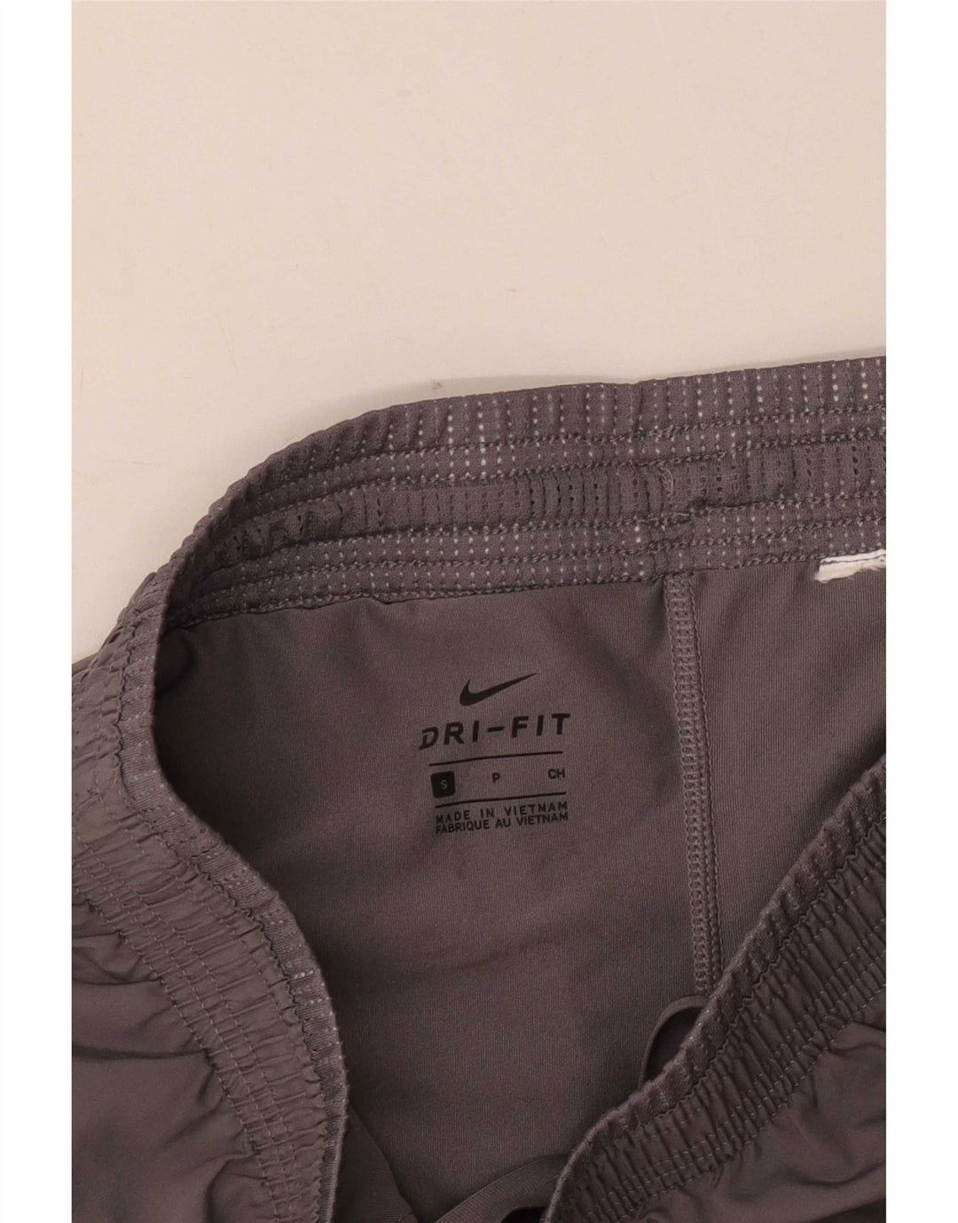Nike - Pantalones cortos deportivos Dri Fit para mujer, talla 10, color gris