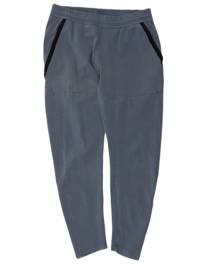 NIKE Hombre Pantalones de chándal de algodón color block en azul medio