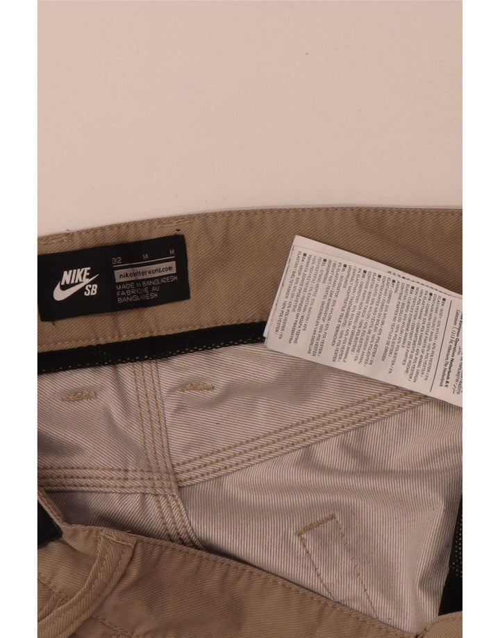 Nike - Pantalones cortos informales regulares para hombre W32 nailon beige mediano