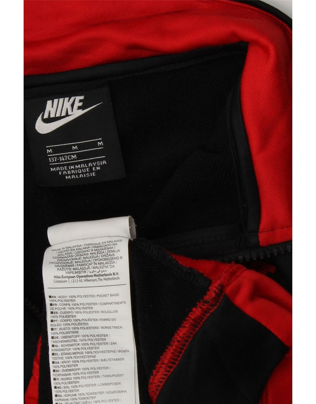 Nike Chaqueta de chándal para niños 10-11 años Mediana Negro Colorblock