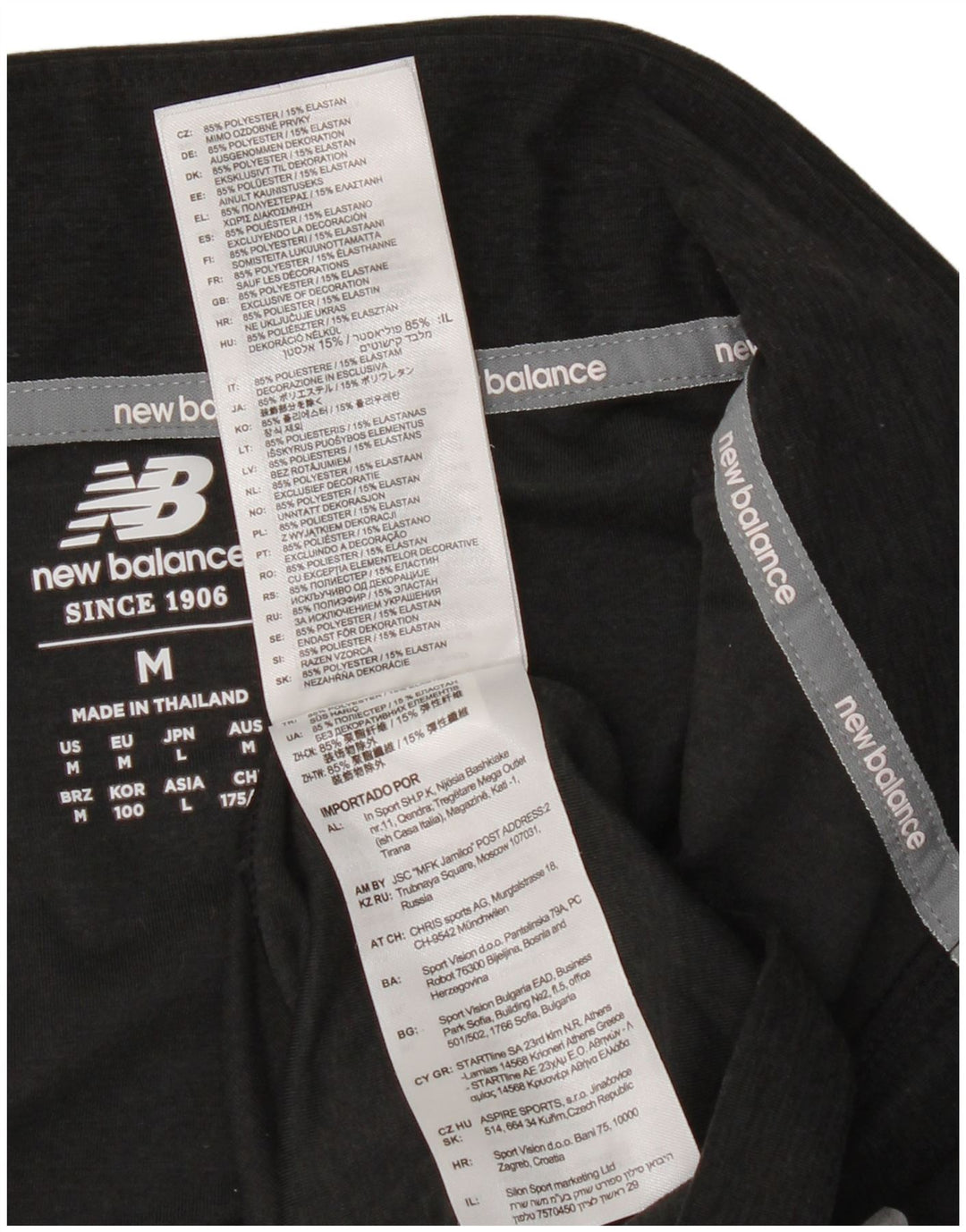 New Balance Hombre Zip Neck Jersey Chándal Top Mediano Negro Moteado