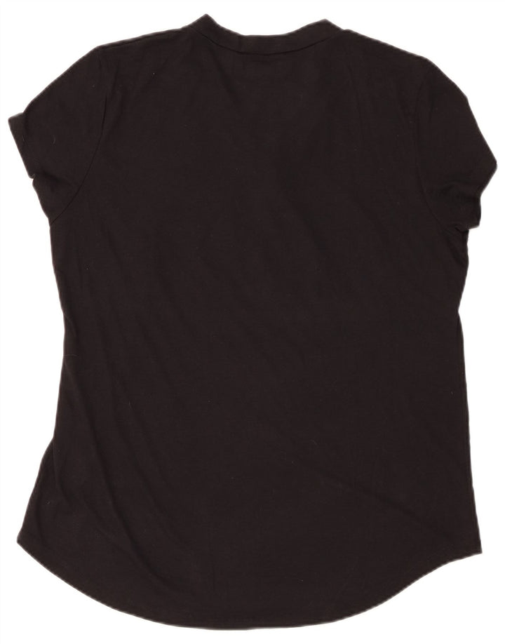 NFL - Camiseta gráfica para mujer New Orleans Saints, talla grande, algodón negro