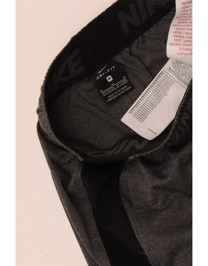 Nike - Pantalones cortos deportivos Dri Fit para niños, 11-12 años, color gris medio