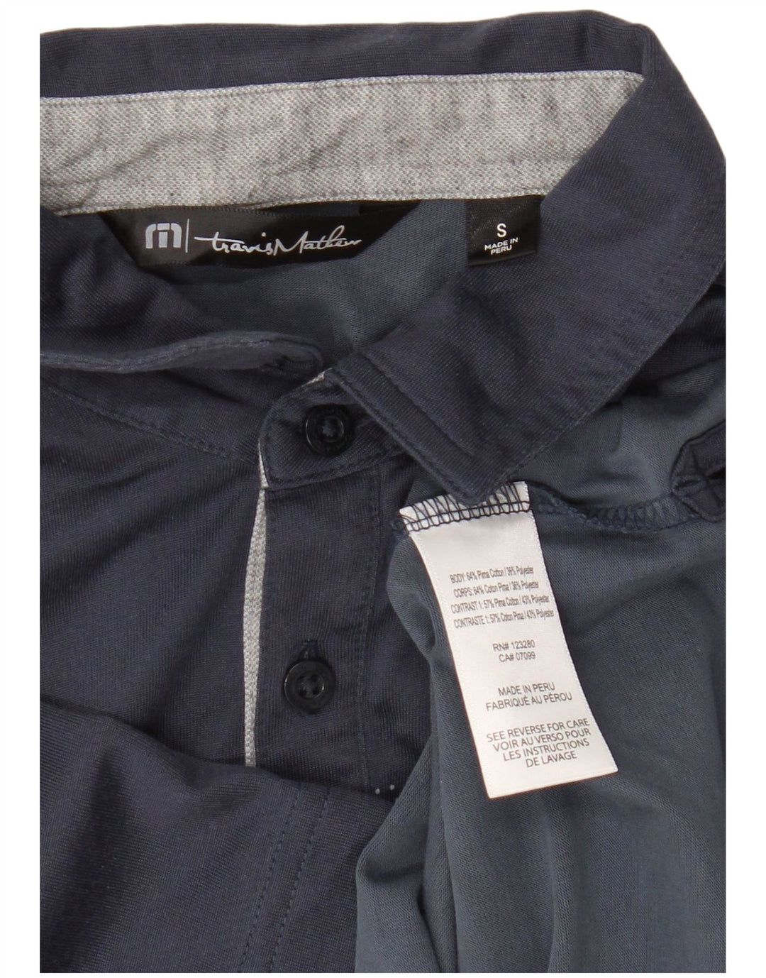 Travis Mathew Polo gráfico para hombre pequeño algodón azul marino