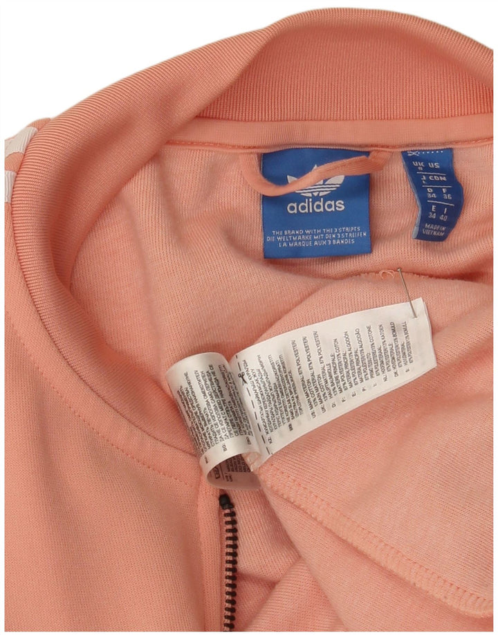 Adidas - Chaqueta de chándal gráfica para mujer, talla 8, poliéster rosa pequeño