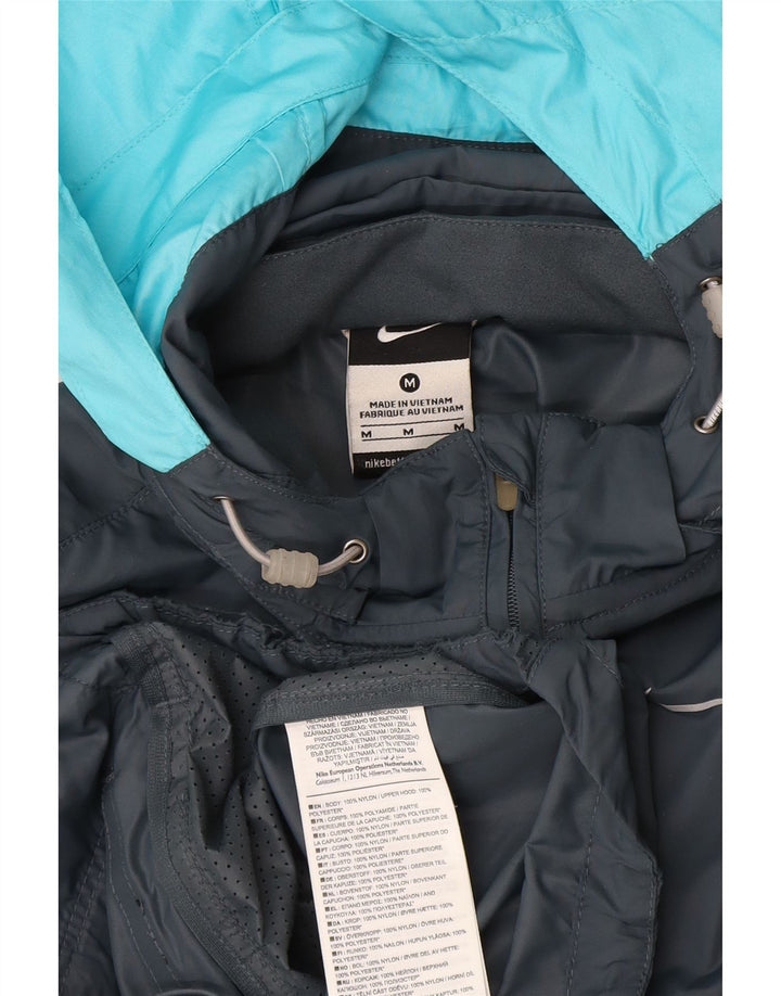 Chaqueta impermeable con capucha Nike para mujer UK 40 Nylon gris medio con bloques de color