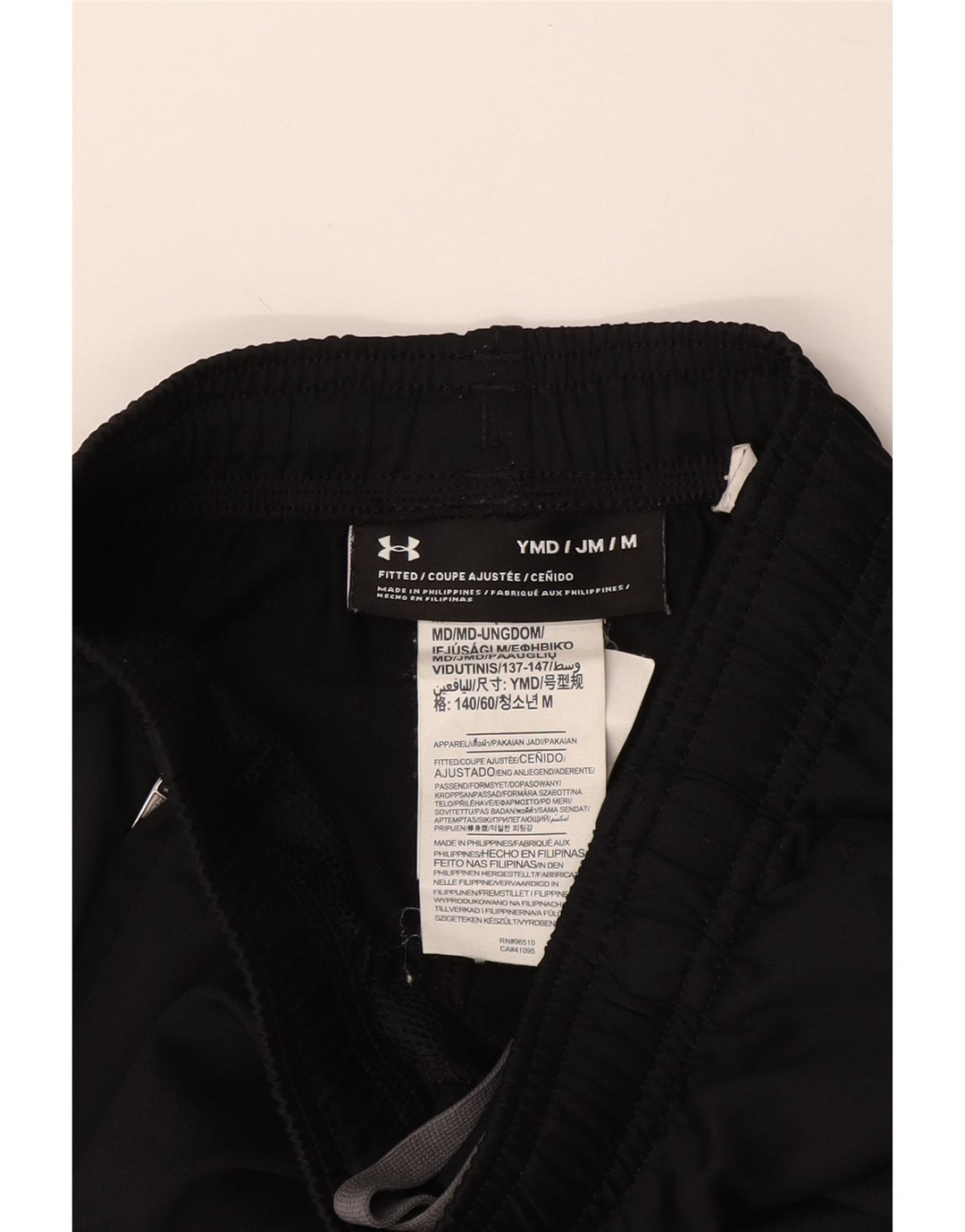 UNDER ARMOUR Pantalones de chándal ajustados para niño 9-10 años Mediano Negro