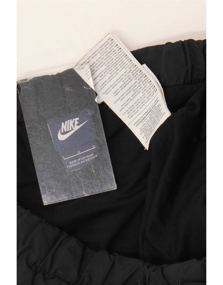 Nike - Pantalones de chándal para hombre, color negro, poliéster