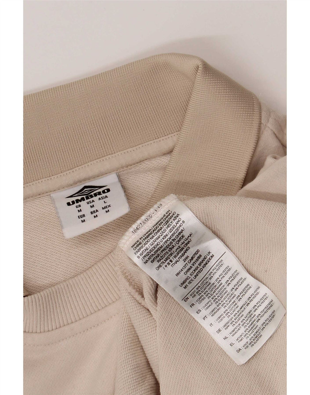 Umbro Sudadera con cuello tipo polo de algodón color block en beige medio