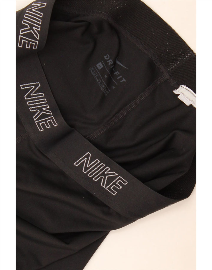 Nike - Leggings capri Dri Fit para mujer, talla M, color negro