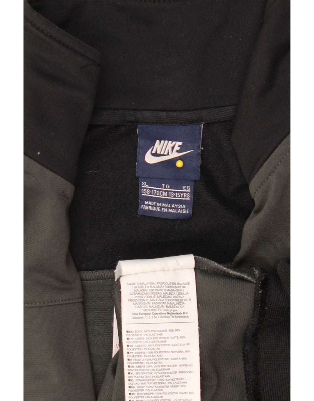 Nike Chaqueta de chándal para niños 13-14 años XL Gris Colorblock Poliéster