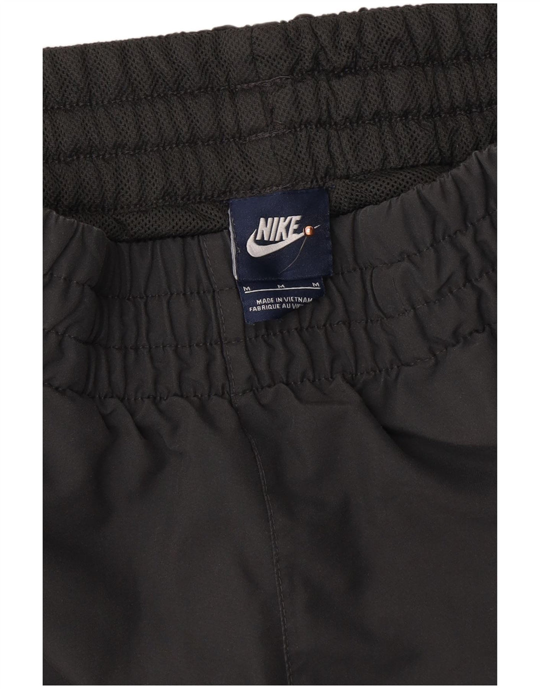 NIKE Hombre Pantalones de Chándal Joggers Gris Medio Poliéster