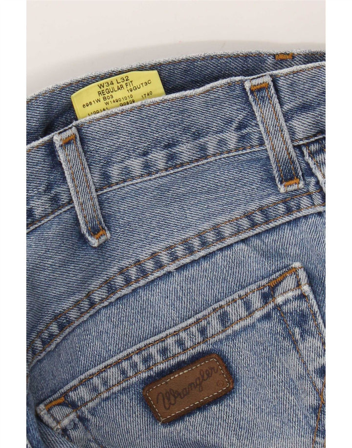 Wrangler Vaqueros rectos de corte regular para hombre W34 L32 Algodón azul