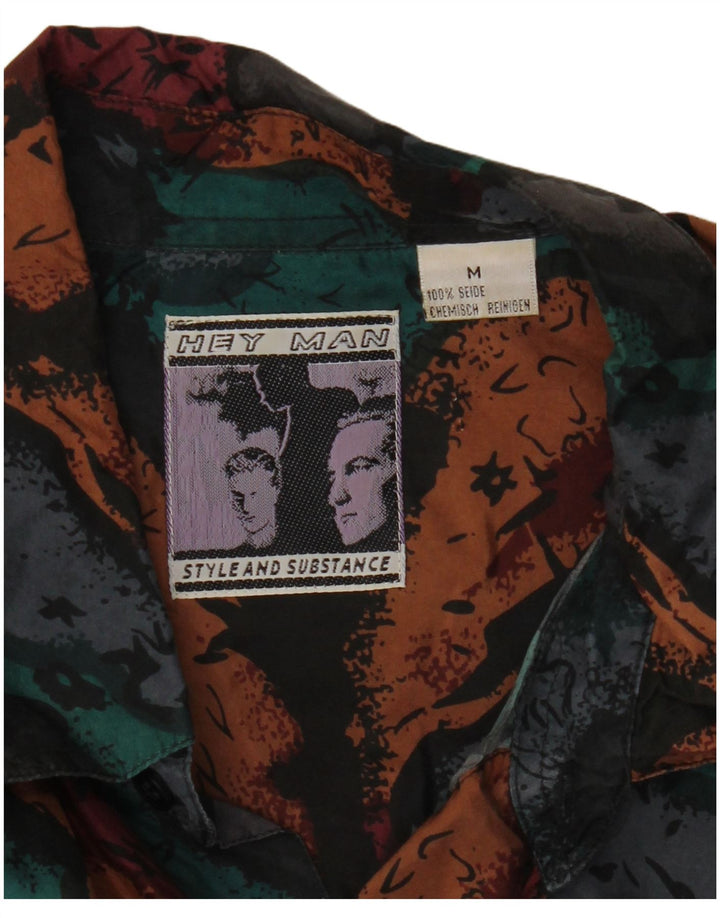 Vintage hombres patrón abstracto camisa de manga corta seda multicolor medio