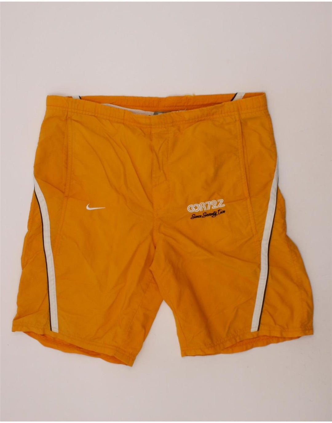 NIKE Boys Graphic Sport Shorts 12-13 Years Large Orange Vintage Nike and Second-Hand Nike from Messina Hembry 